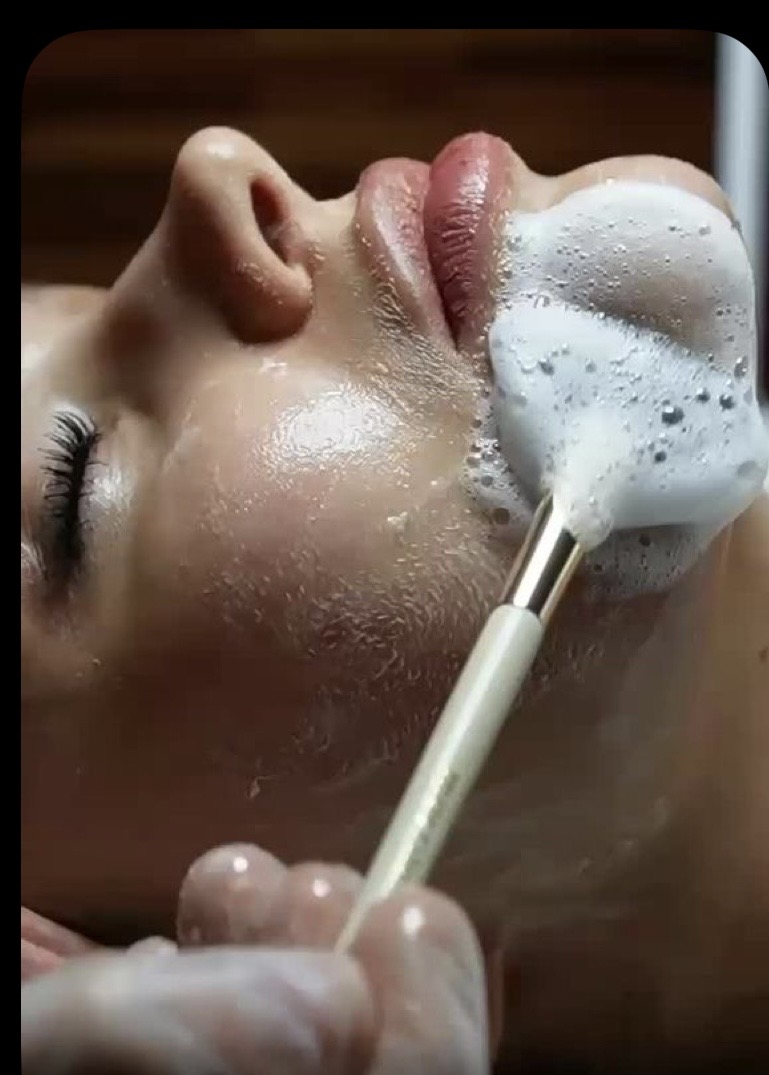 Close-up of a calming foam cleanse facial treatment